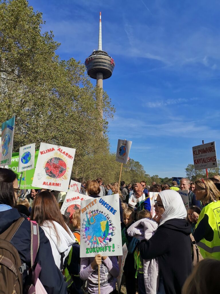 Photo of protest crowd holding signs.